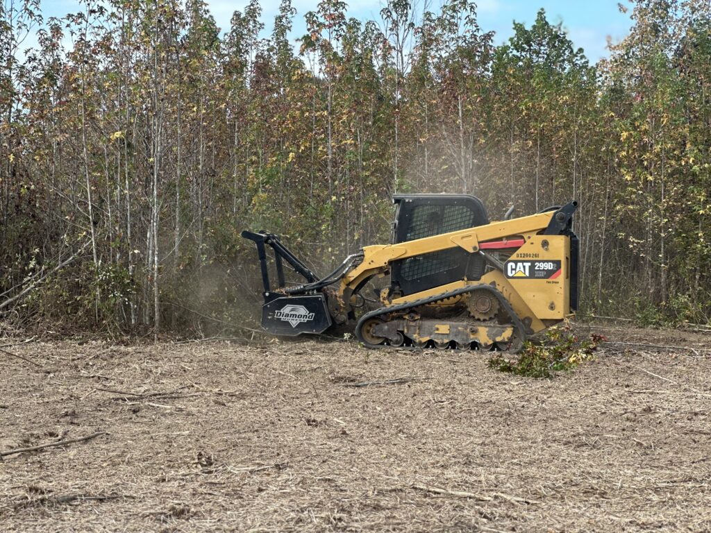 skid steer with drum mulcher