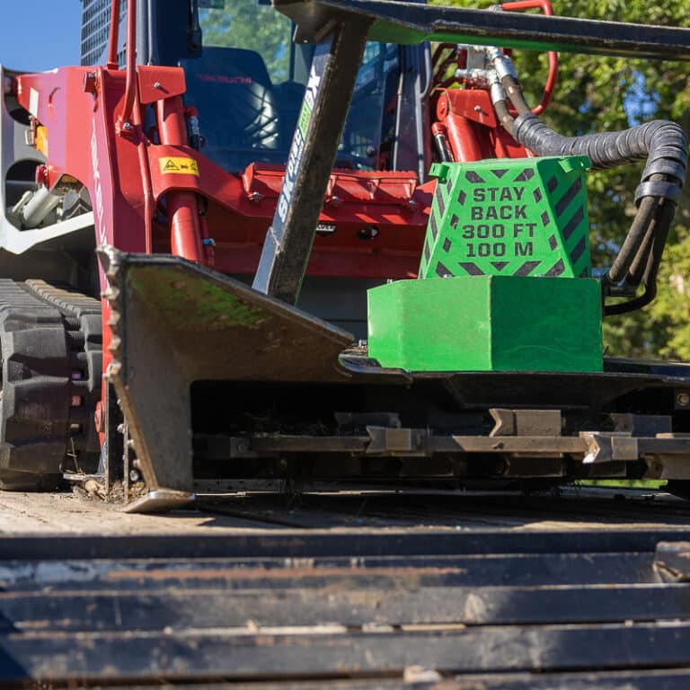 skid steer with disc mulcher attached