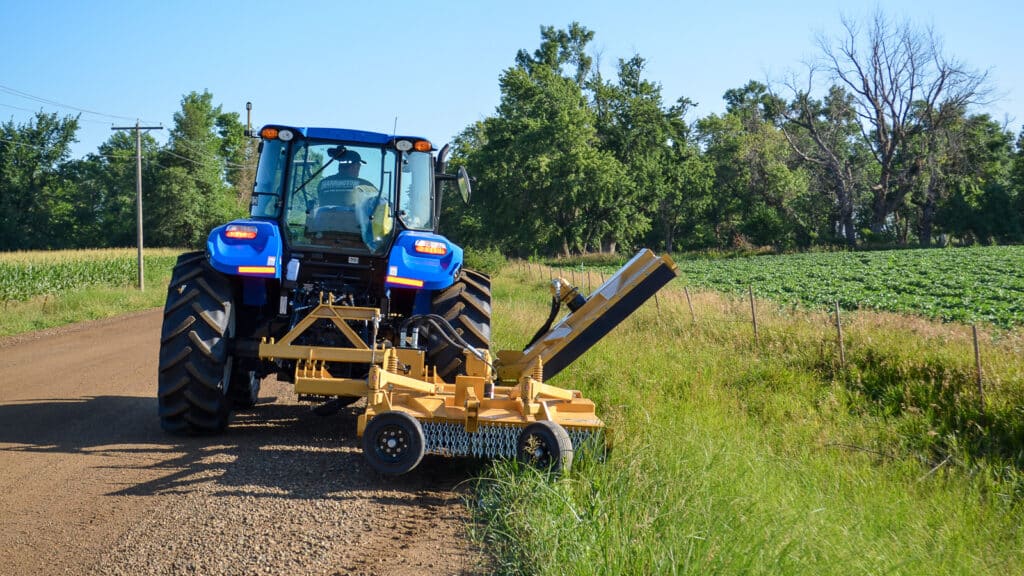 tractor with side rotary mower