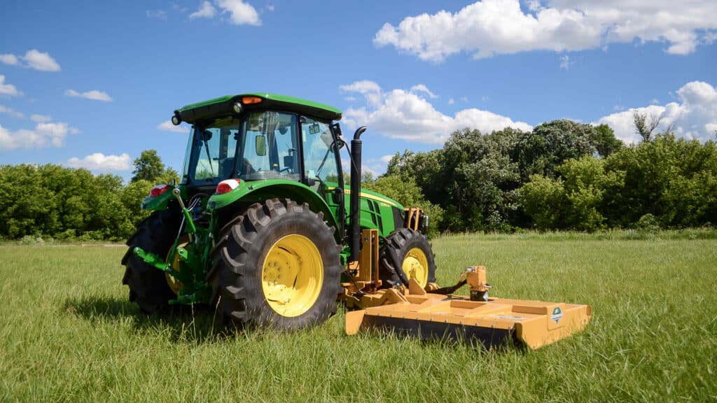 tractor with side rotary mower