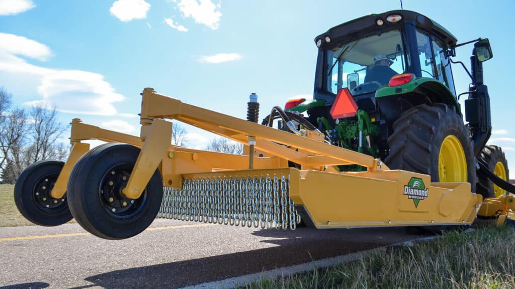 tractor with side rotary mower