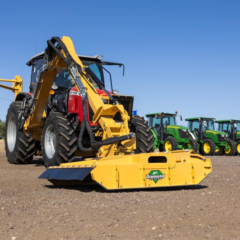 tractor with Diamond Mowers brush cutter attached