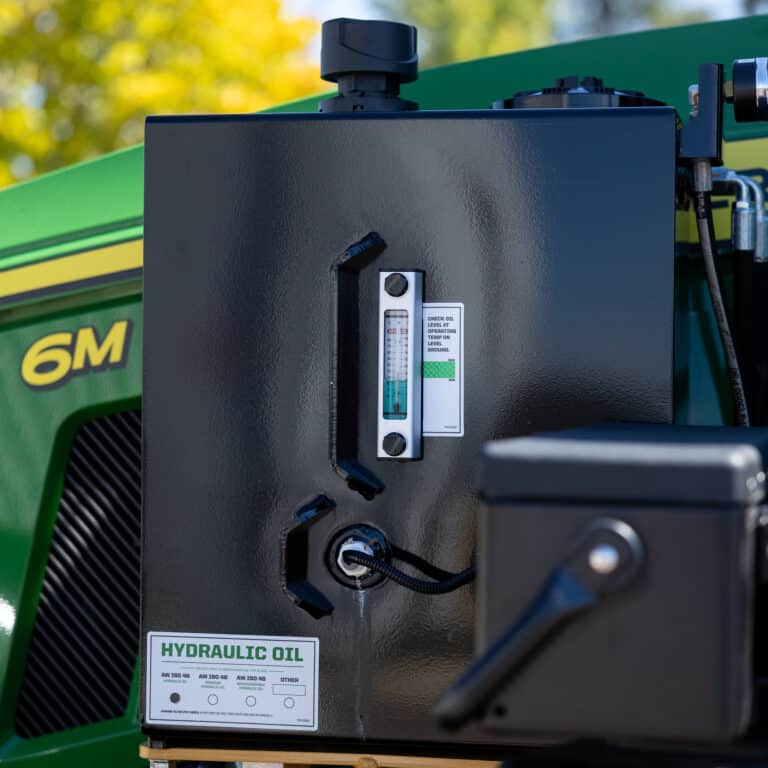 mid mount boom motor hydraulic fluid tank