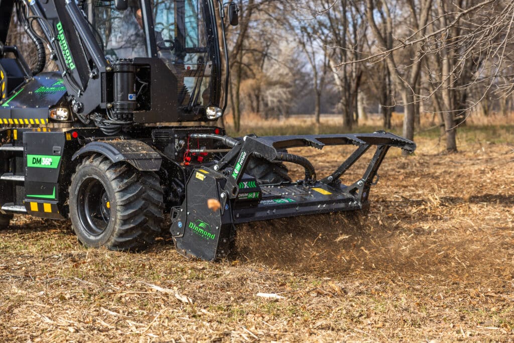 dm 360 with drum mulcher attached on lower hydraulic