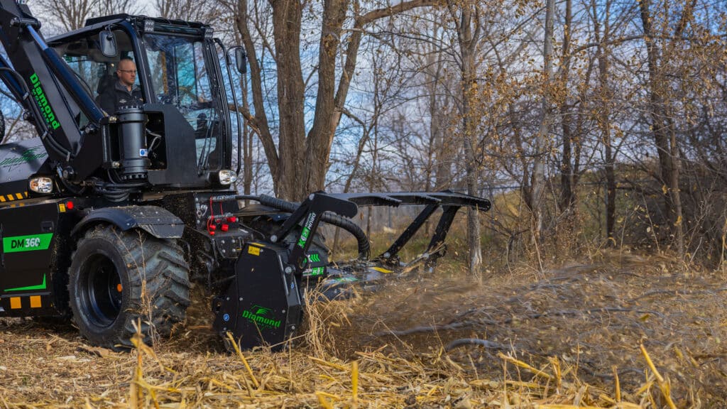 dm 360 with drum mulcher attached on lower hydraulic