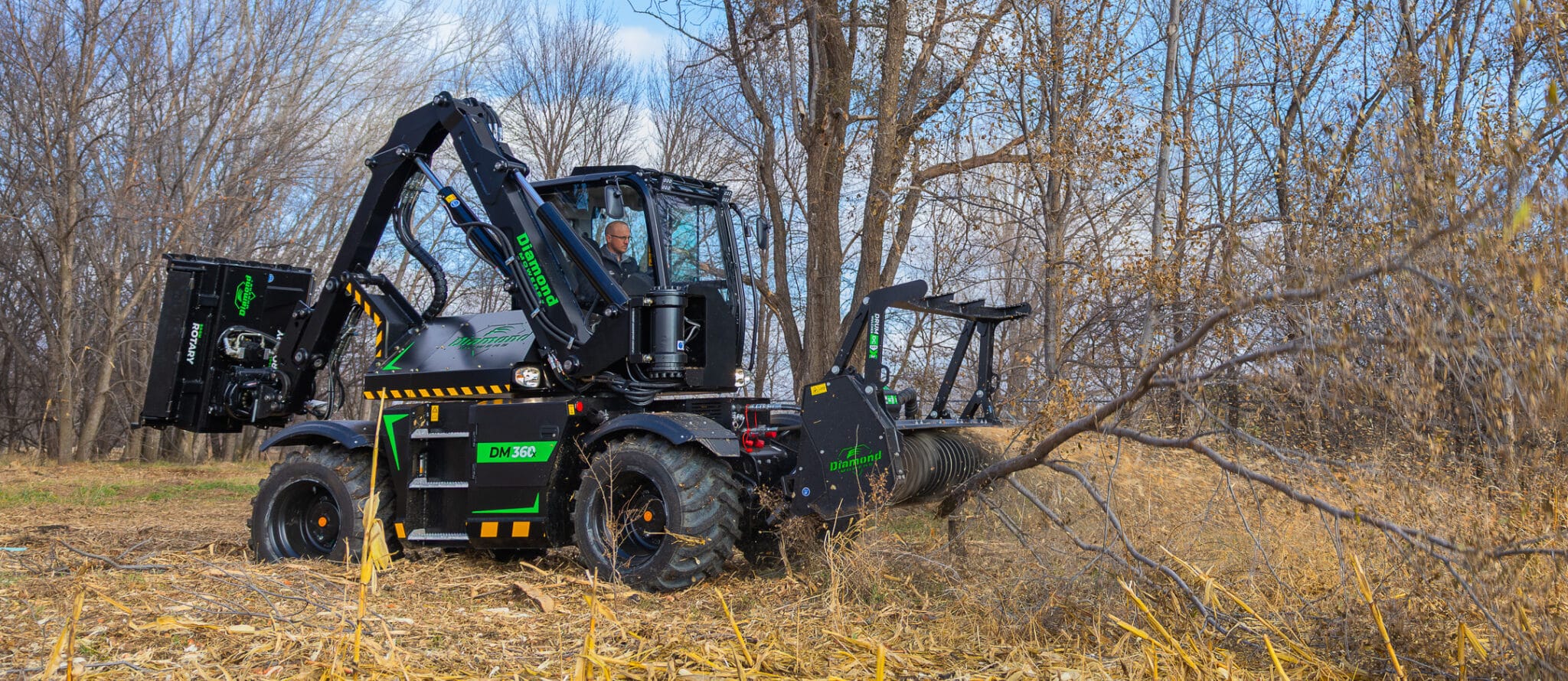 dm360 mulching a tree