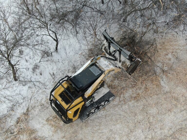 skidloader mulching in winter